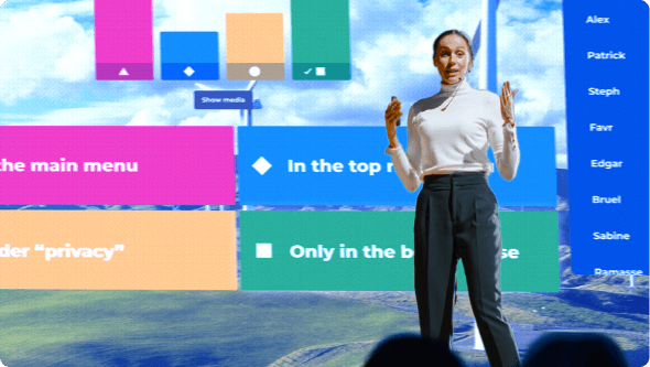 Female presenter using Kahoot! to present at a large event